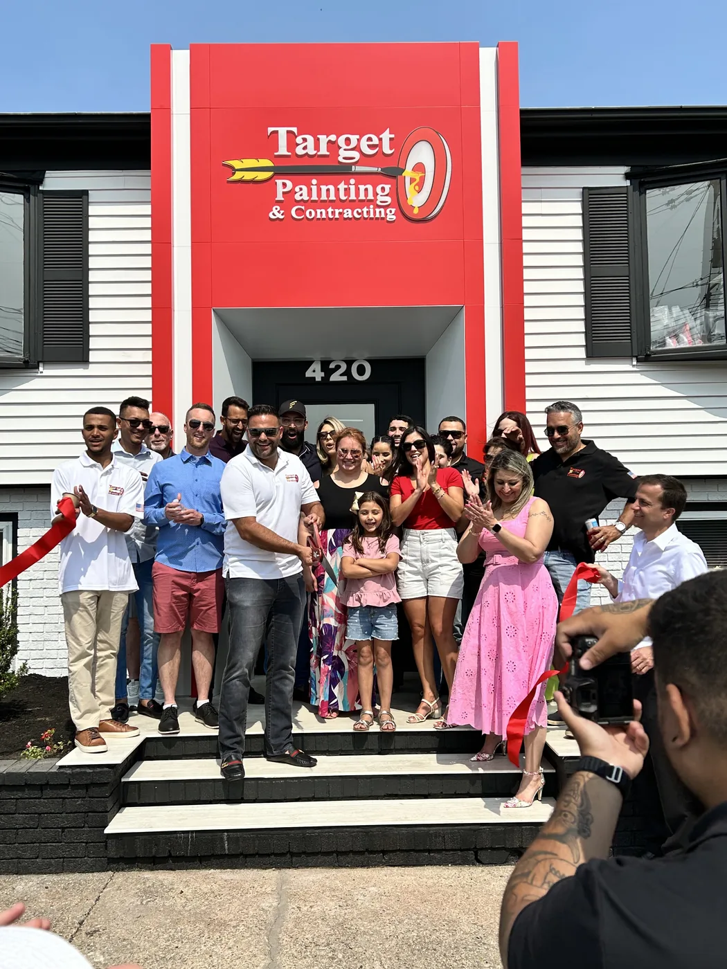 Ribbon cutting at the Target Painting Cape Cod office in South Dennis