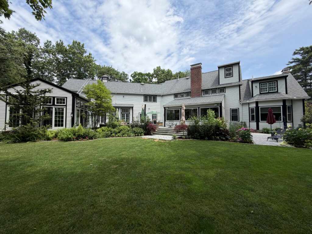 Exterior of a New England home painted in a 2026 color palette.